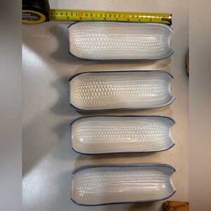 Vintage Pfaltzgraff Yorktowne stoneware corn on the cob dishes.
